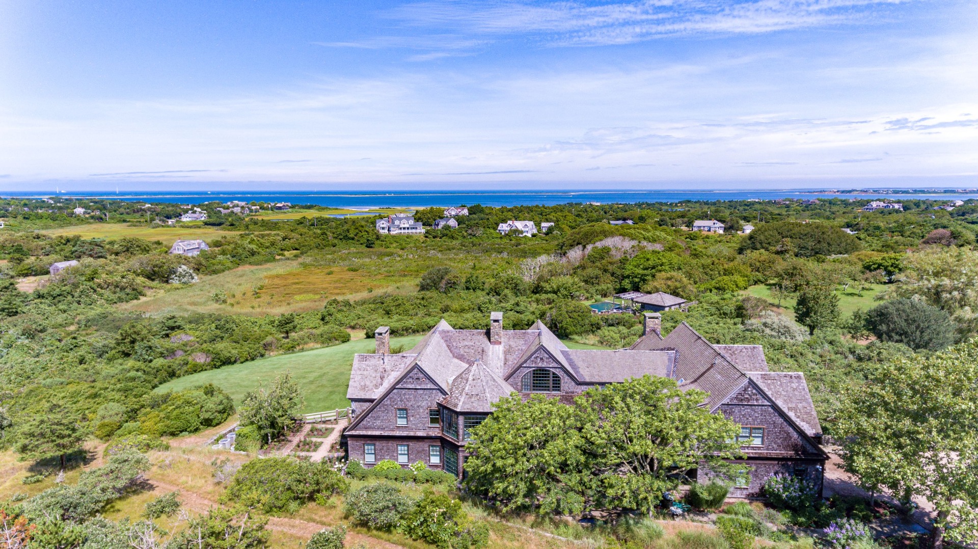 183 Polpis Road Nantucket, MA 02554 - Photo 10 of 62 an aerial view of residential houses with outdoor space and trees