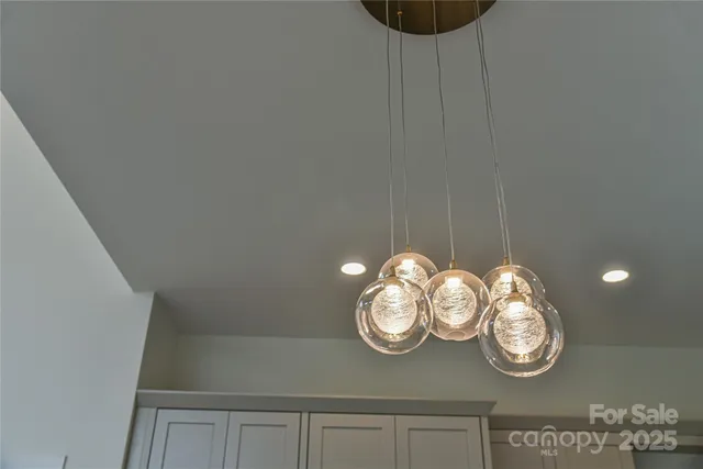 an aerial view of a house with swimming pool