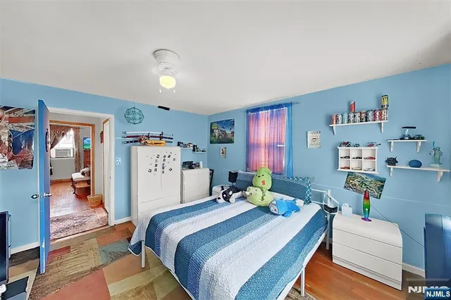 a room with furniture and a flat screen tv