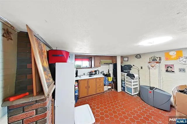 a room with furniture and a flat screen tv