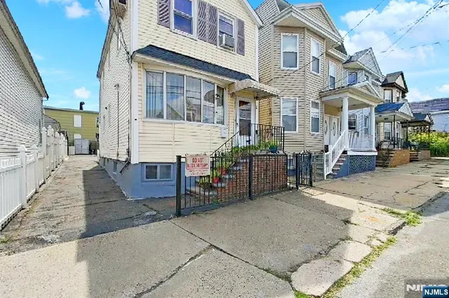 a view of a street with cars