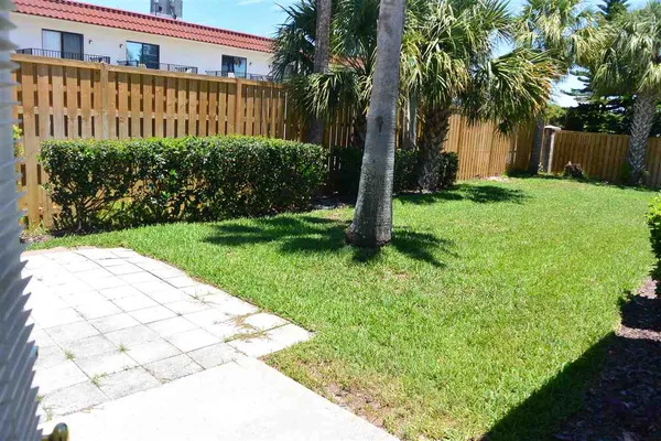 a view of a house with a garden