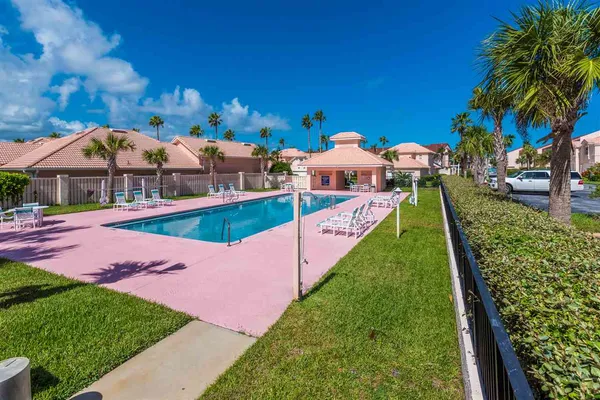 a view of an outdoor space and basketball court