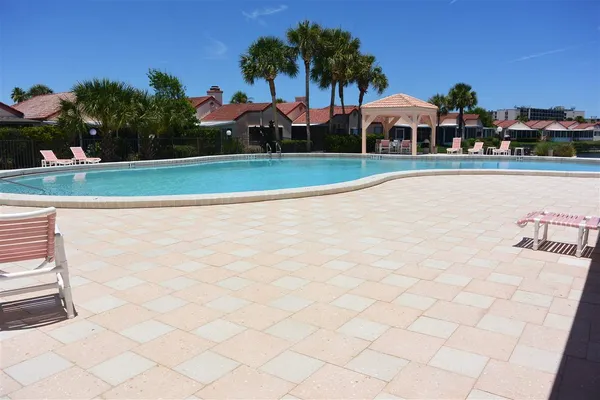 a view of a swimming pool with an ocean view