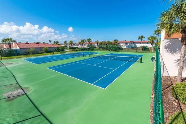 a view of a swimming pool and an outdoor space