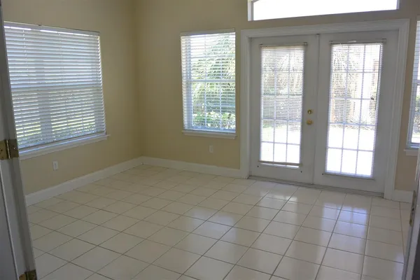 an empty room with windows