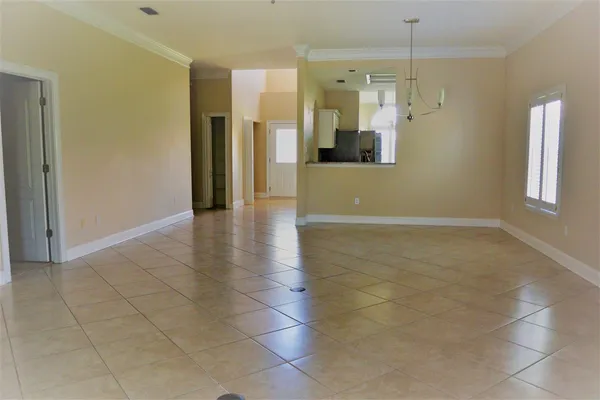 a view of a bathroom with a glass shower door