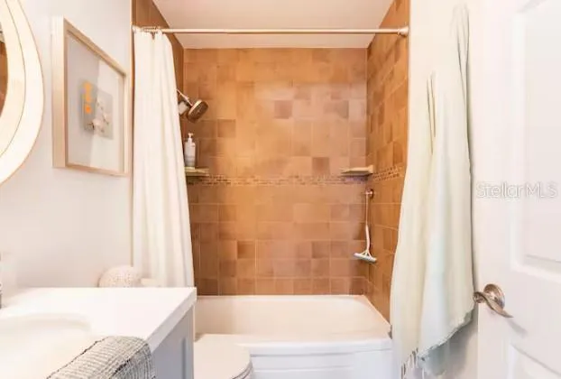 a view of a balcony with an ocean