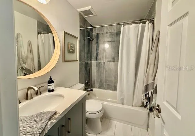 a bathroom with a sink and toilet