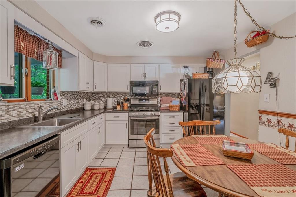 2668 Pangburn Hollow Road Monongahela, PA 15063 - Photo 11 of 44 a kitchen with a sink appliances and cabinets