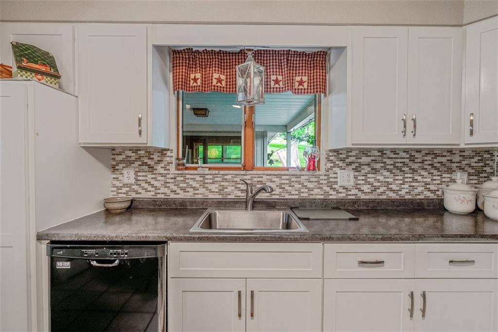 2668 Pangburn Hollow Road Monongahela, PA 15063 - Photo 12 of 44 a kitchen with stainless steel appliances granite countertop a sink and a granite counter tops