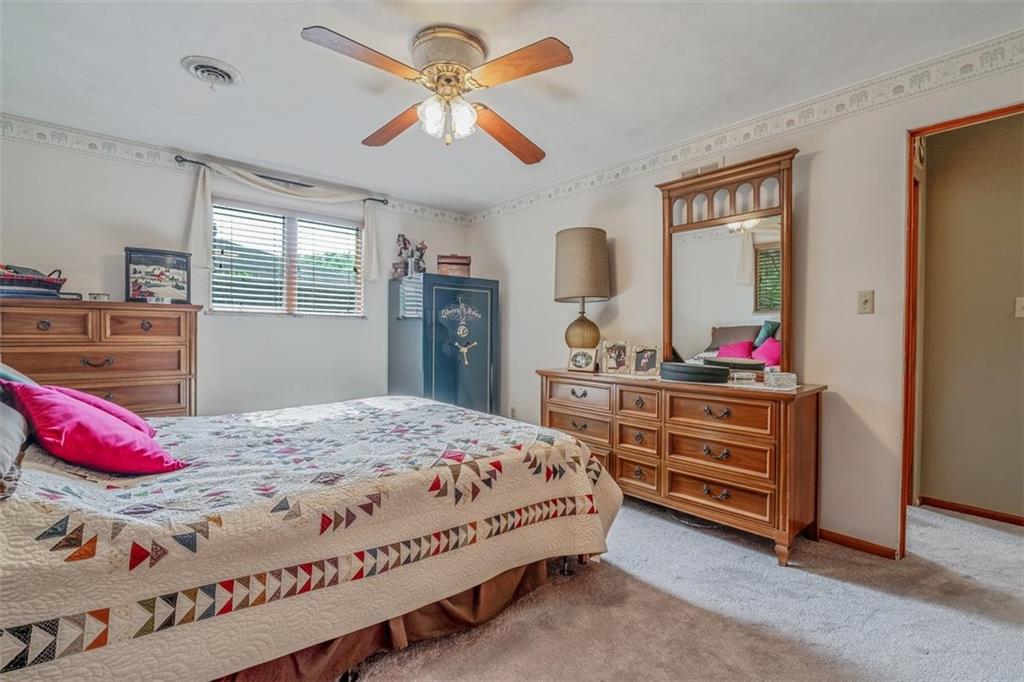 2668 Pangburn Hollow Road Monongahela, PA 15063 - Photo 24 of 44 a bedroom with a bed and a dresser