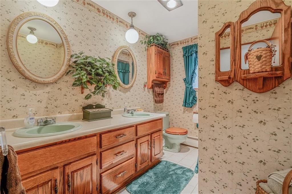 2668 Pangburn Hollow Road Monongahela, PA 15063 - Photo 26 of 44 a bathroom with a toilet a sink and mirror