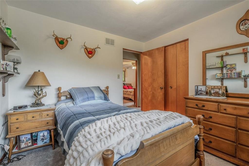 2668 Pangburn Hollow Road Monongahela, PA 15063 - Photo 30 of 44 a bedroom with a bed and a dresser in it