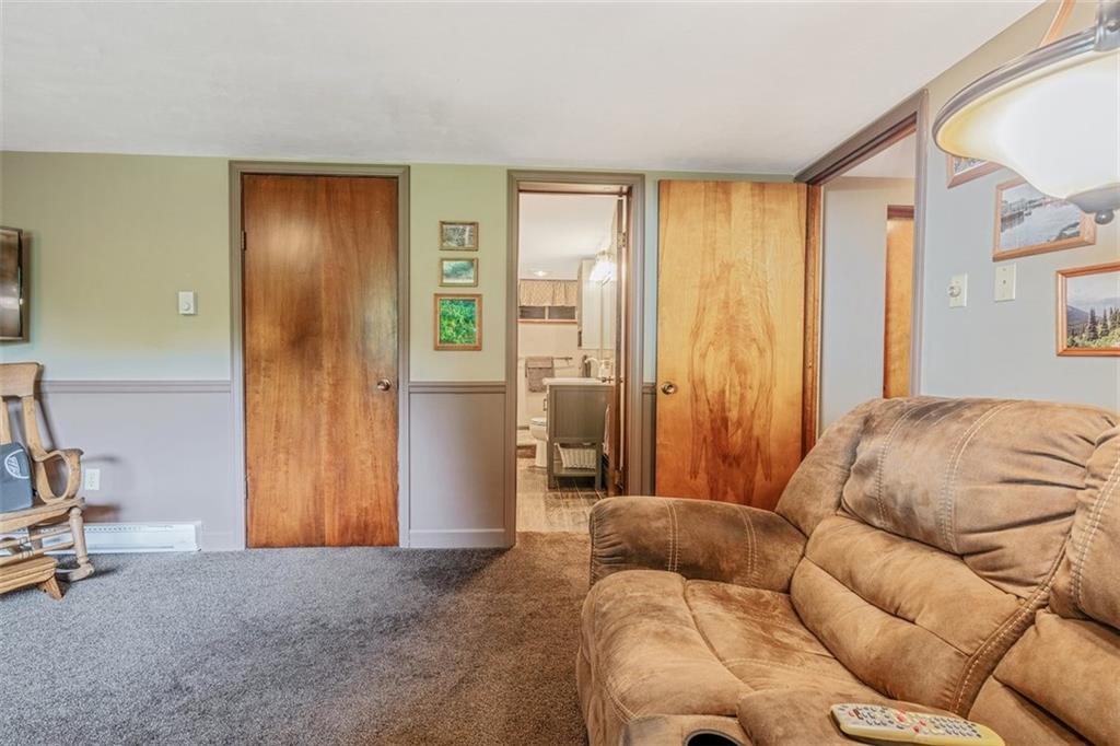 2668 Pangburn Hollow Road Monongahela, PA 15063 - Photo 36 of 44 a living room with furniture and a window