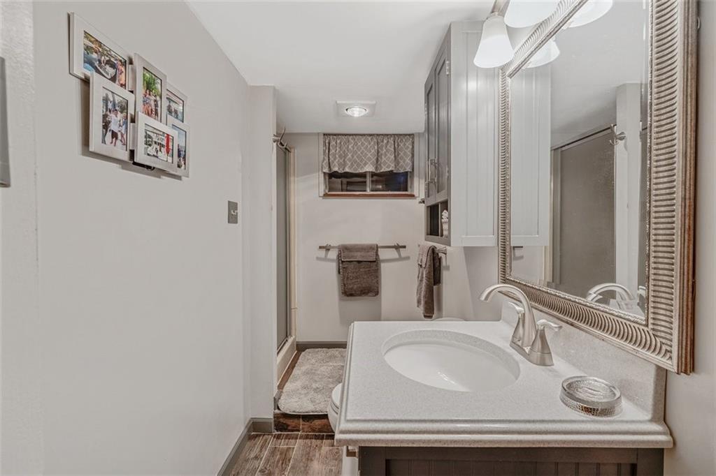 2668 Pangburn Hollow Road Monongahela, PA 15063 - Photo 37 of 44 a bathroom with a sink and a mirror