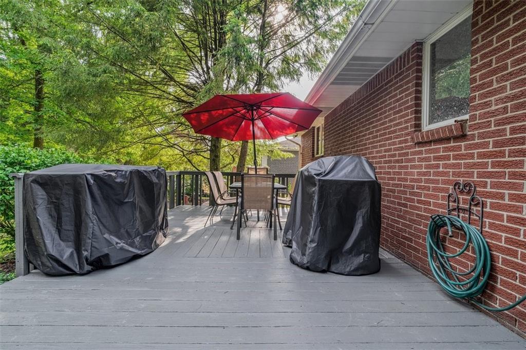 2668 Pangburn Hollow Road Monongahela, PA 15063 - Photo 44 of 44 an outdoor sitting area with furniture and umbrella