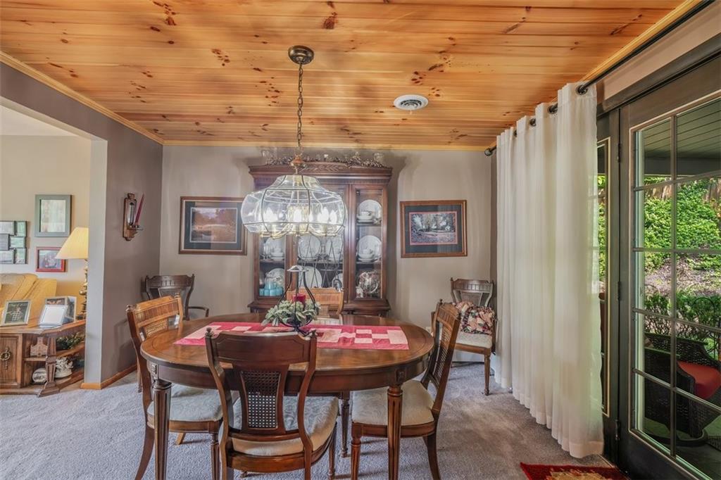 2668 Pangburn Hollow Road Monongahela, PA 15063 - Photo 7 of 44 a dining room with furniture a chandelier and window