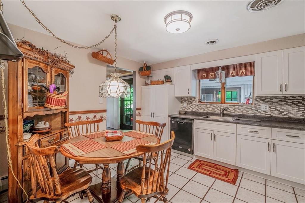 2668 Pangburn Hollow Road Monongahela, PA 15063 - Photo 10 of 44 a kitchen with stainless steel appliances granite countertop a sink and a refrigerator
