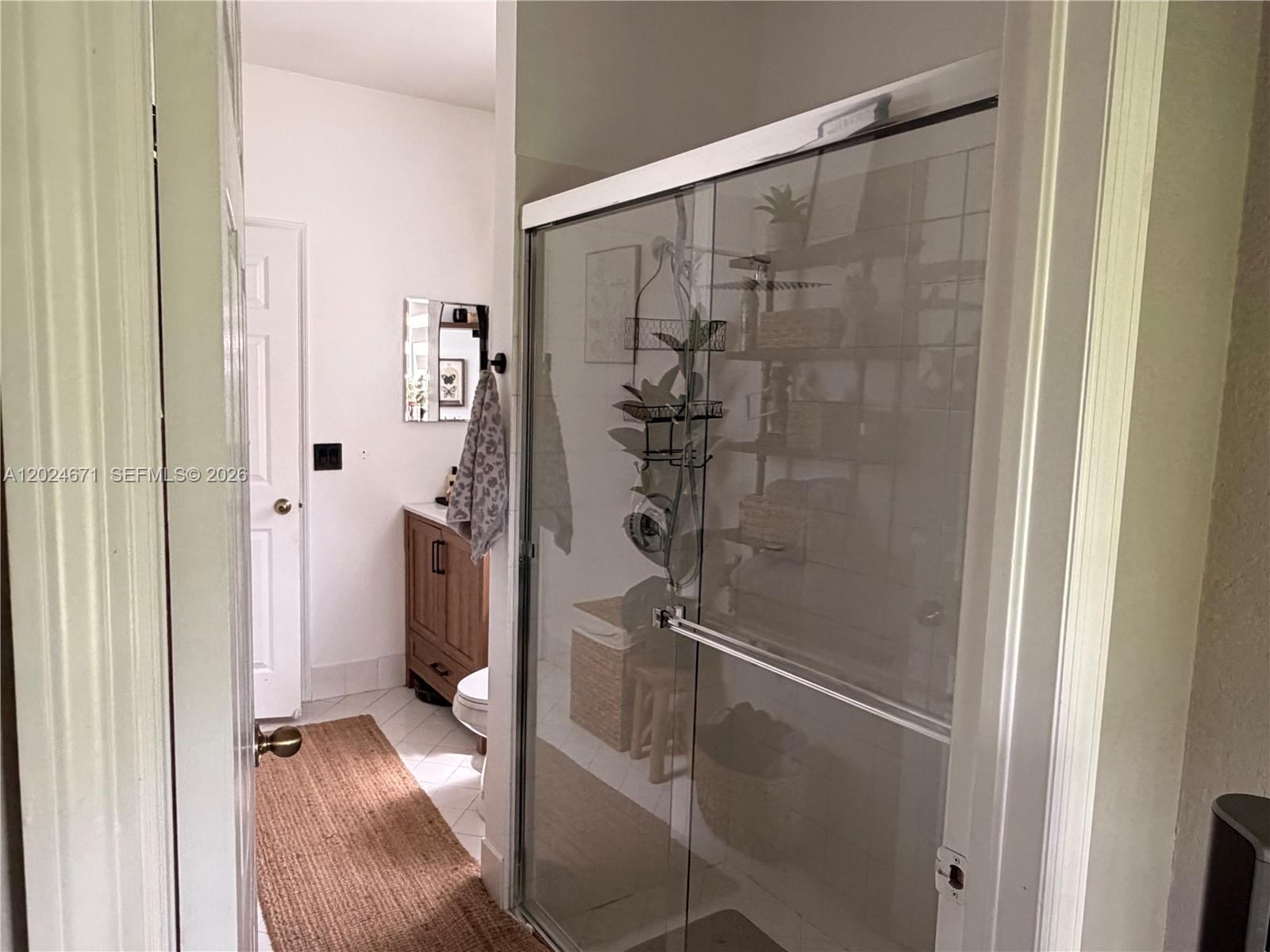 2116 Northeast 38th Road, Unit 2116 Homestead, FL 33033 - Photo 22 of 31 a bathroom with a shower