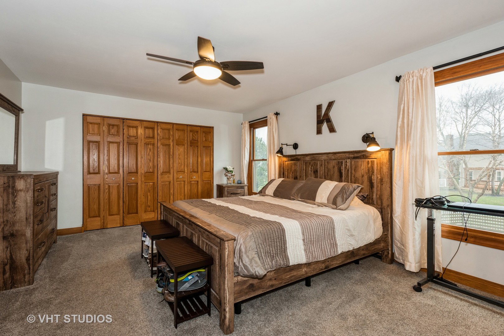 Undisclosed Address Carol Stream, IL 60188 - Photo 15 of 17 a bedroom with a bed and a television
