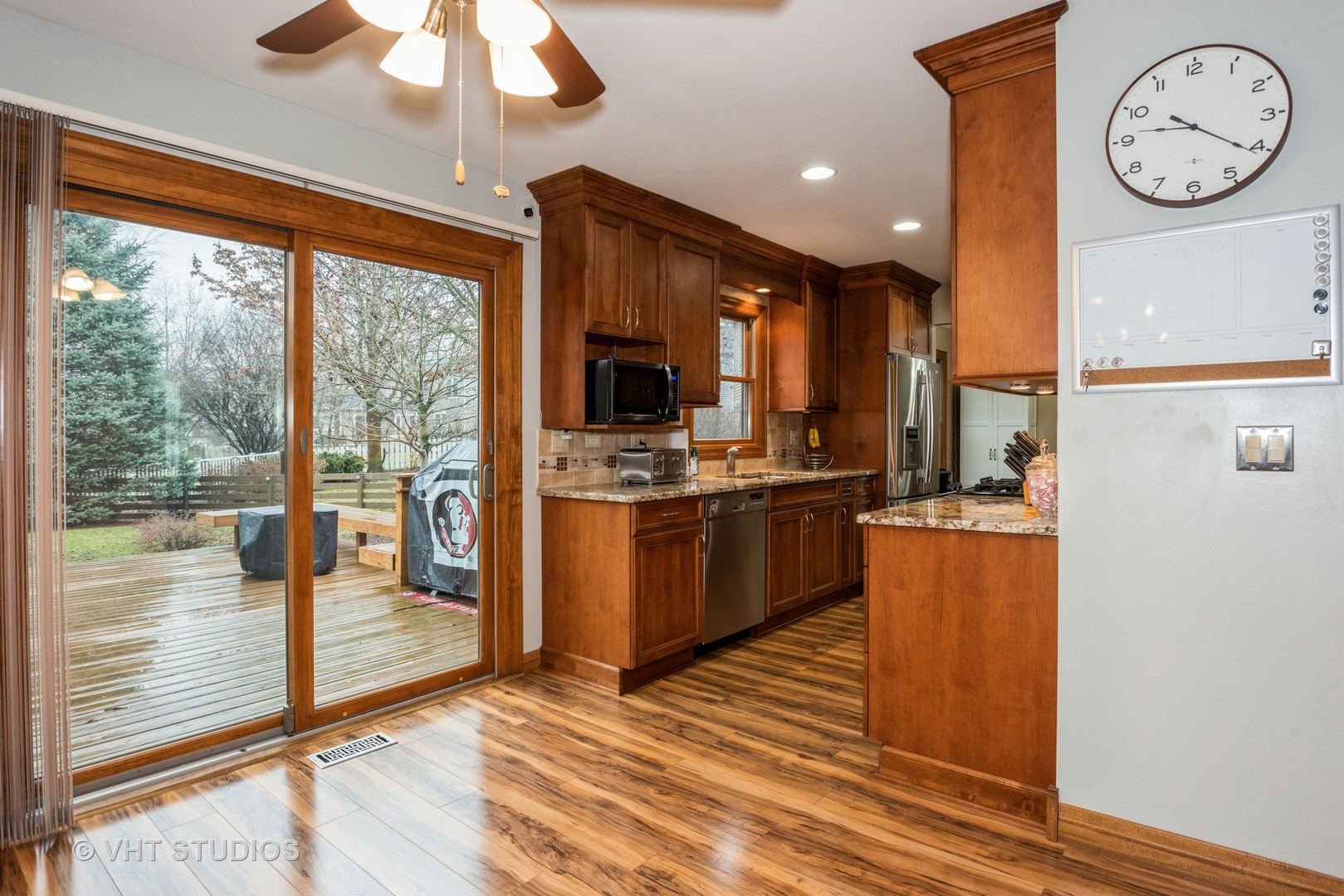 Undisclosed Address Carol Stream, IL 60188 - Photo 6 of 17 a open kitchen with a large window and stainless steel appliances