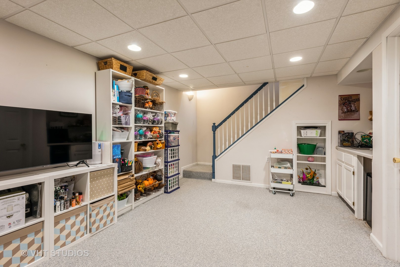 Undisclosed Address Carol Stream, IL 60188 - Photo 8 of 17 a living room with furniture and a flat screen tv