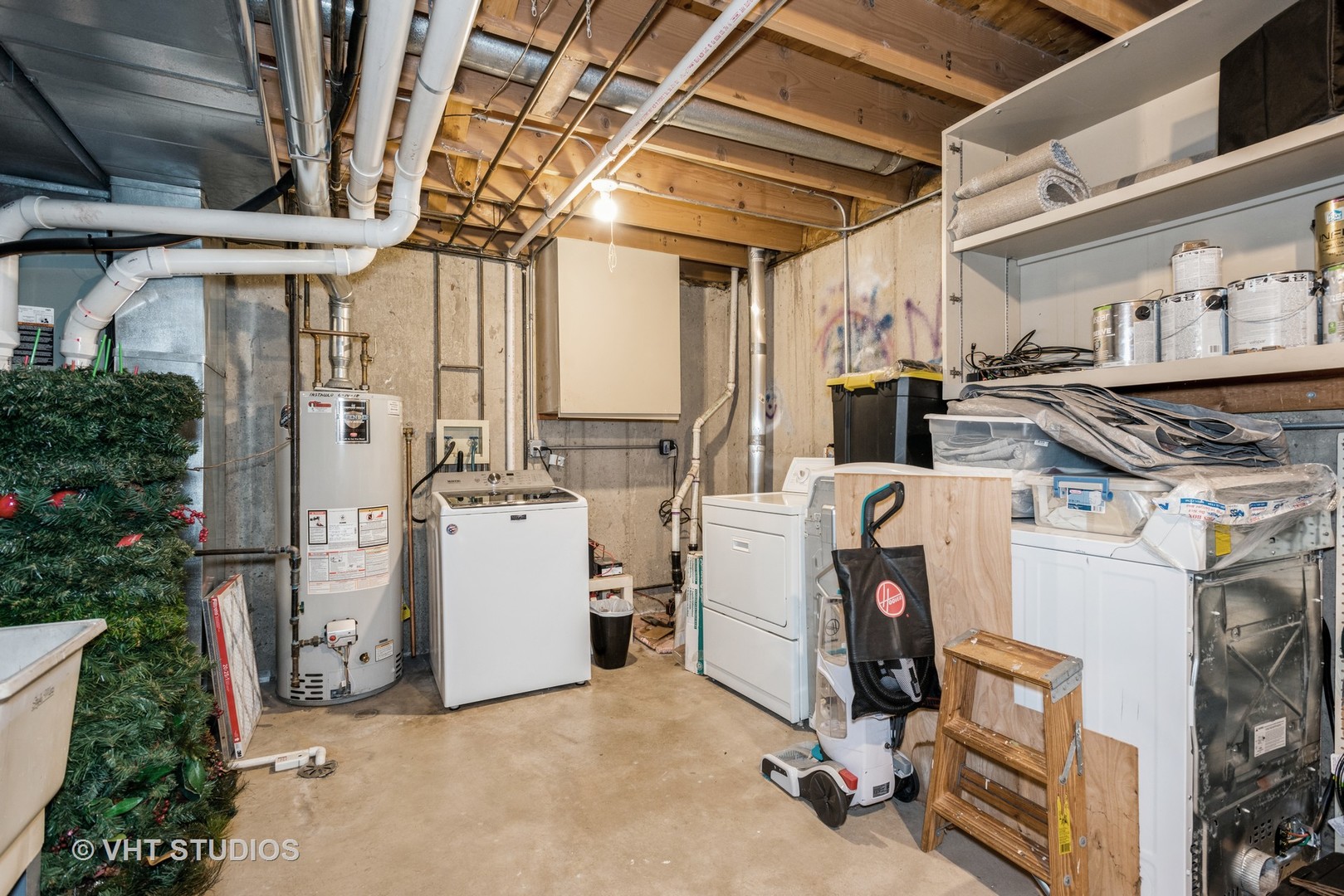 Undisclosed Address Carol Stream, IL 60188 - Photo 10 of 17 a view of a storage room with washer and dryer