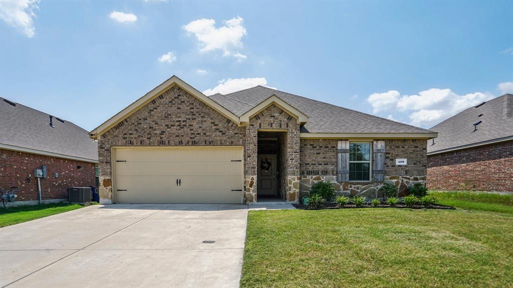 a view of a house with a garden
