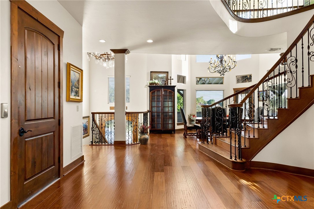 134 Bandit Beach Road New Braunfels, TX 78130 - Photo 19 of 46 a view of entryway with livingroom and wooden floor