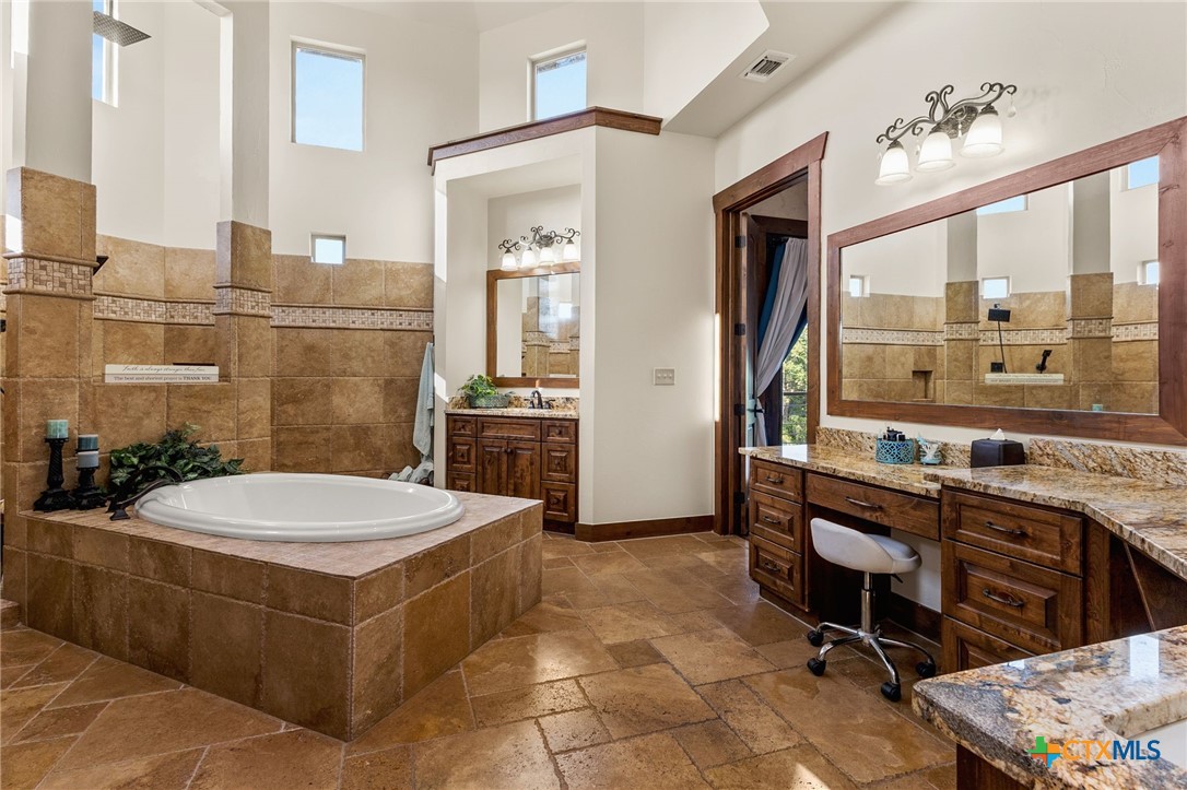 134 Bandit Beach Road New Braunfels, TX 78130 - Photo 29 of 46 a room with a table chairs and entryway