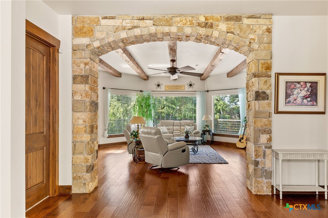 134 Bandit Beach Road New Braunfels, TX 78130 - Photo 7 of 46 a living room with furniture and a large window