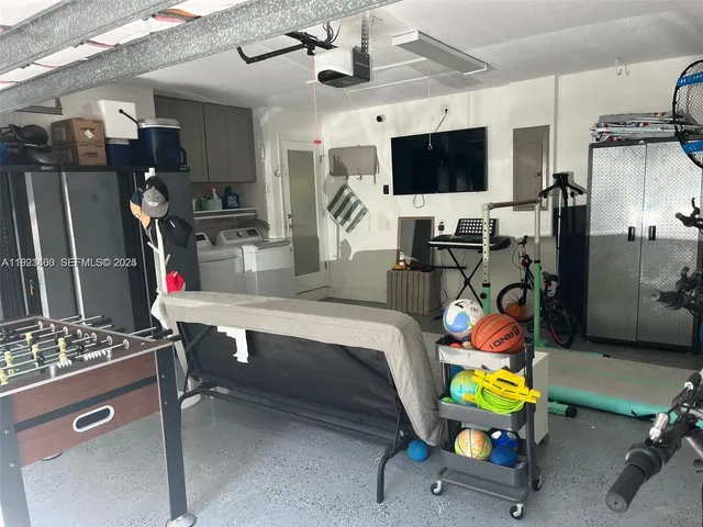 a room with furniture and a flat screen tv