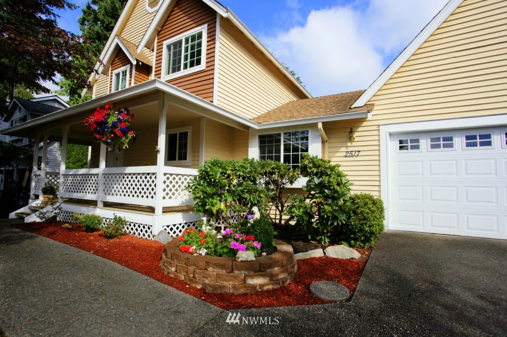 2517 166th Place Southeast Bothell, WA 98012 - Photo 1 of 20 a view of a house with yard and garden