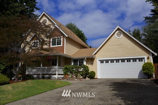 2517 166th Place Southeast Bothell, WA 98012 - Photo 19 of 20 a view of a house with garden and yard