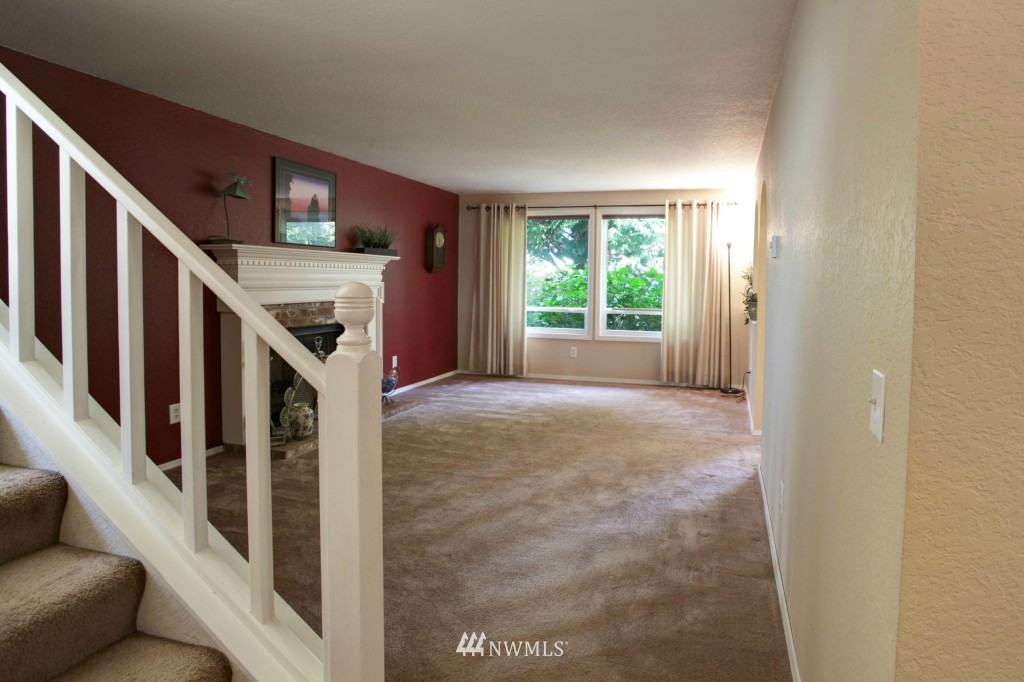 2517 166th Place Southeast Bothell, WA 98012 - Photo 4 of 20 a view of livingroom with furniture and windows