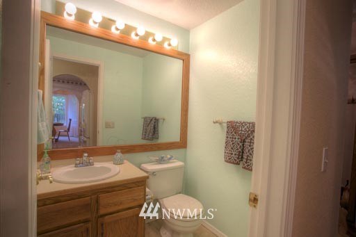 2517 166th Place Southeast Bothell, WA 98012 - Photo 10 of 20 a bathroom with a sink and a mirror