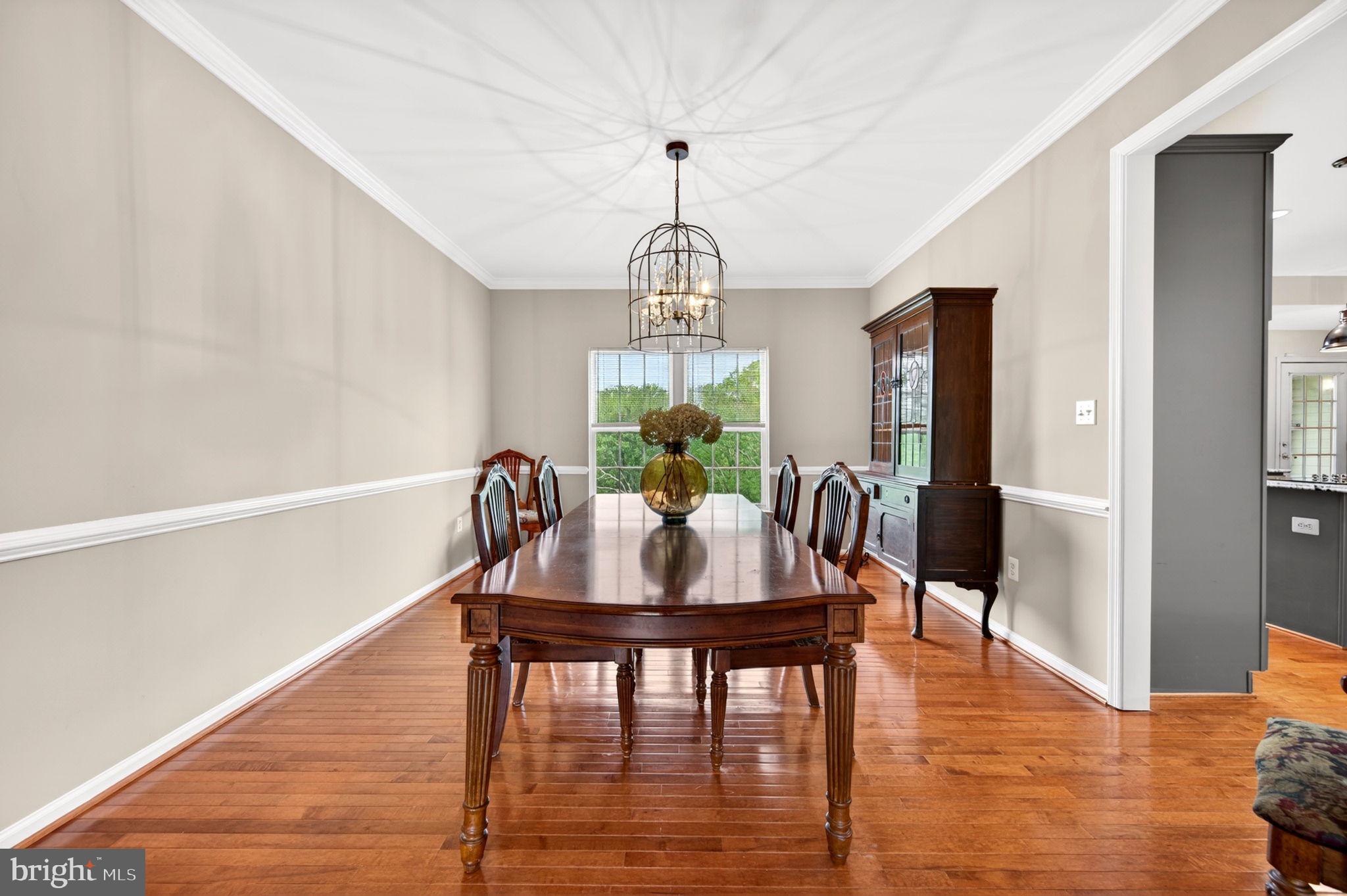 8 North Pointe Terrace Middletown, MD 21769 - Photo 16 of 74 a view of a dining room with furniture window and wooden floor