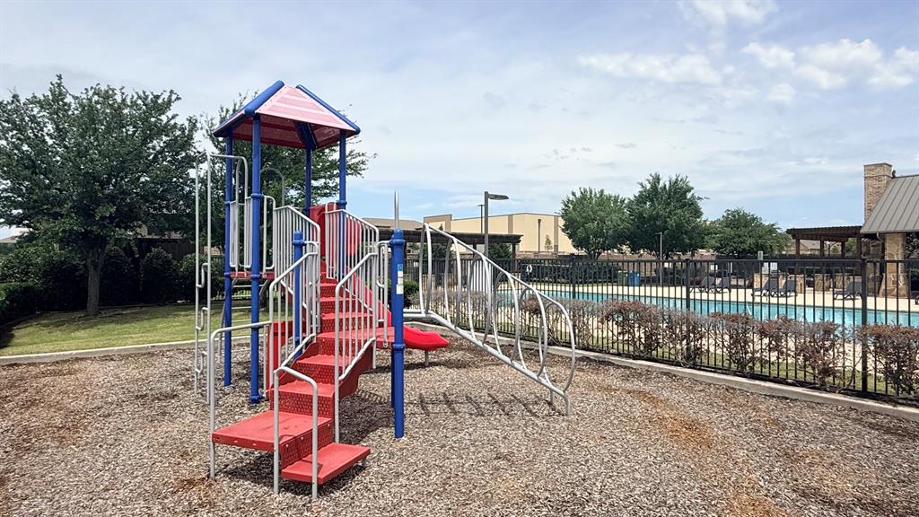 337 Prairie Ridge Lane Lewisville, TX 75056 - Photo 24 of 28 a view of a park with iron fence