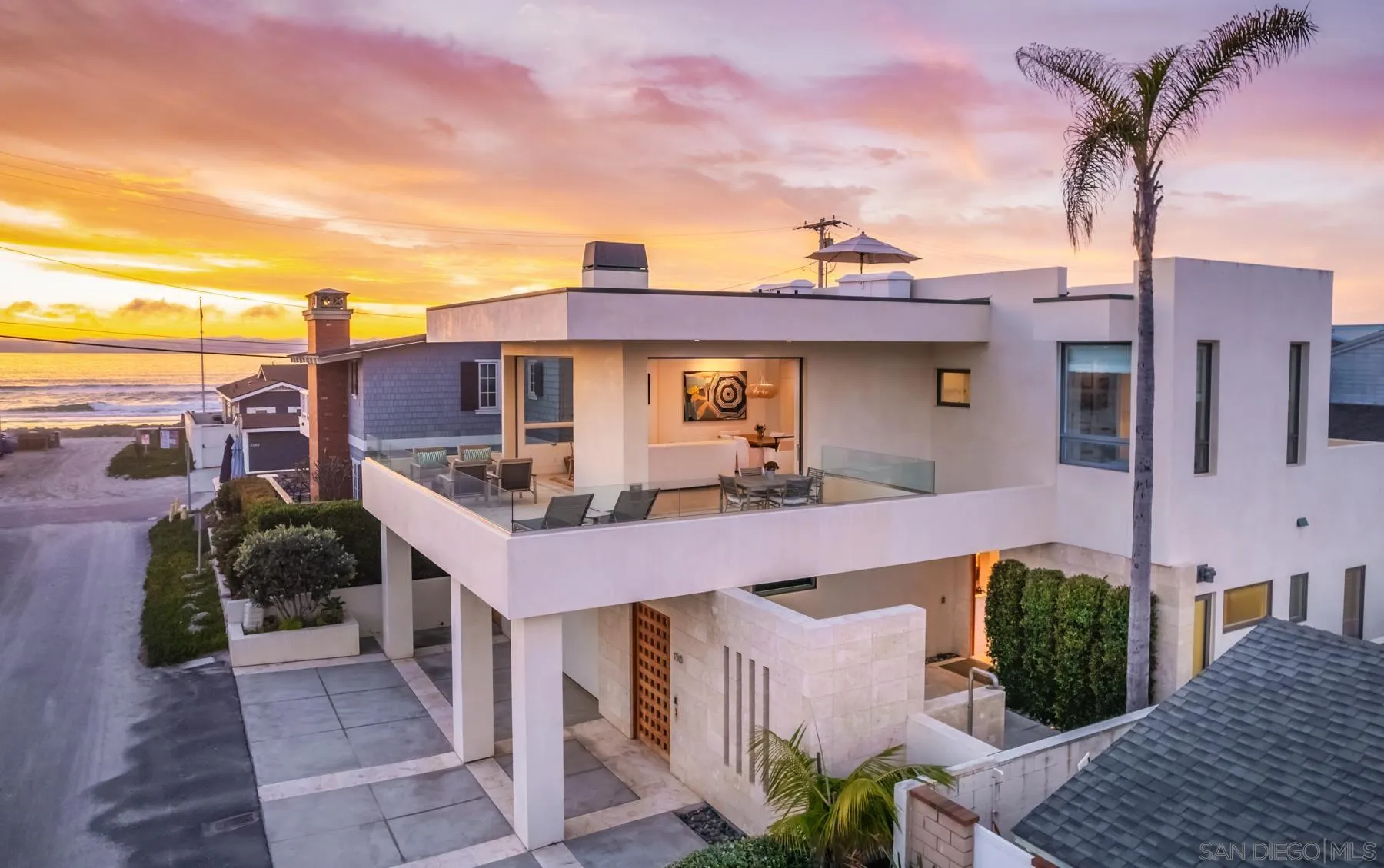 136 23rd Street Del Mar, CA 92014 - Photo 2 of 34 a view of a brick building with a yard