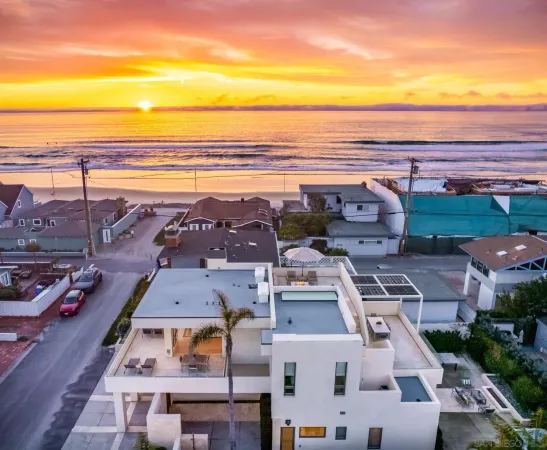 a view of city with ocean