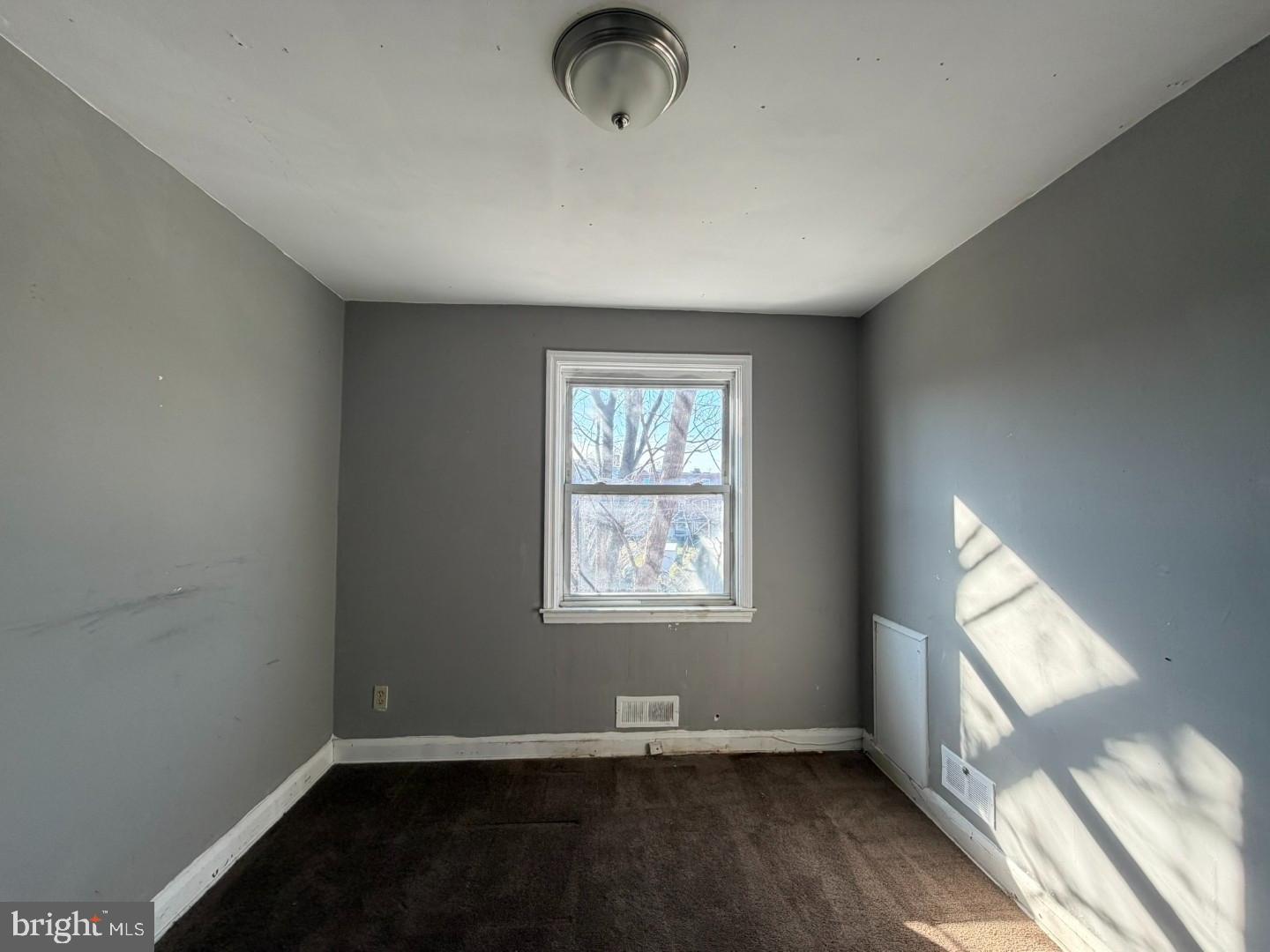 4027 Raymonn Avenue Baltimore, MD 21213 - Photo 14 of 19 an empty room with windows
