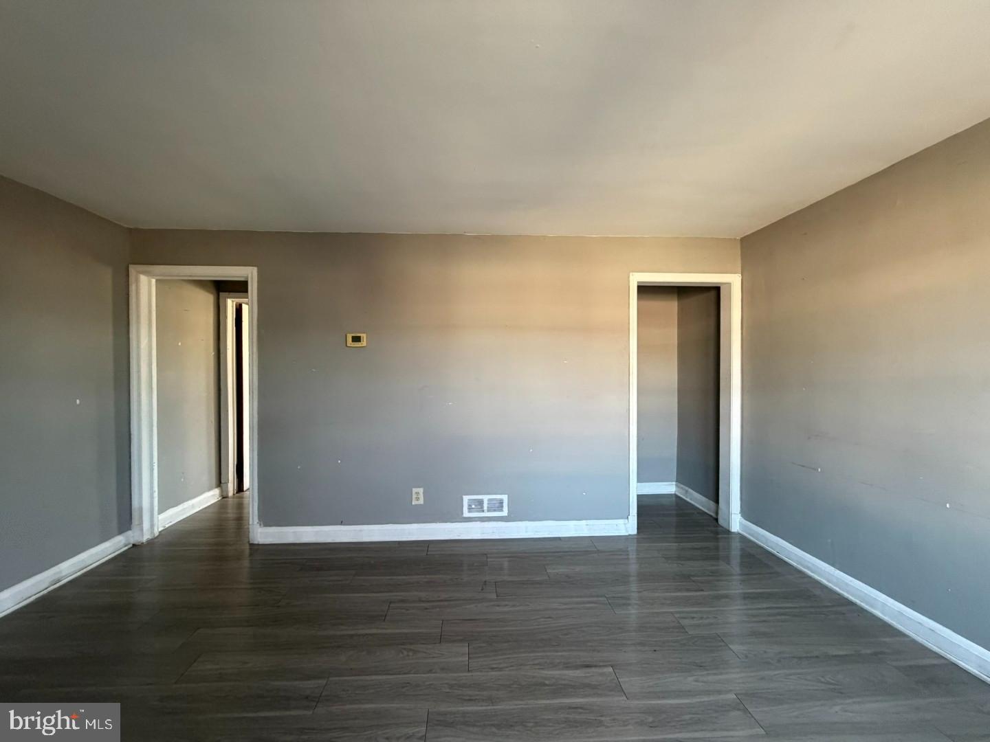 4027 Raymonn Avenue Baltimore, MD 21213 - Photo 3 of 19 a view of wooden floor and brick walls