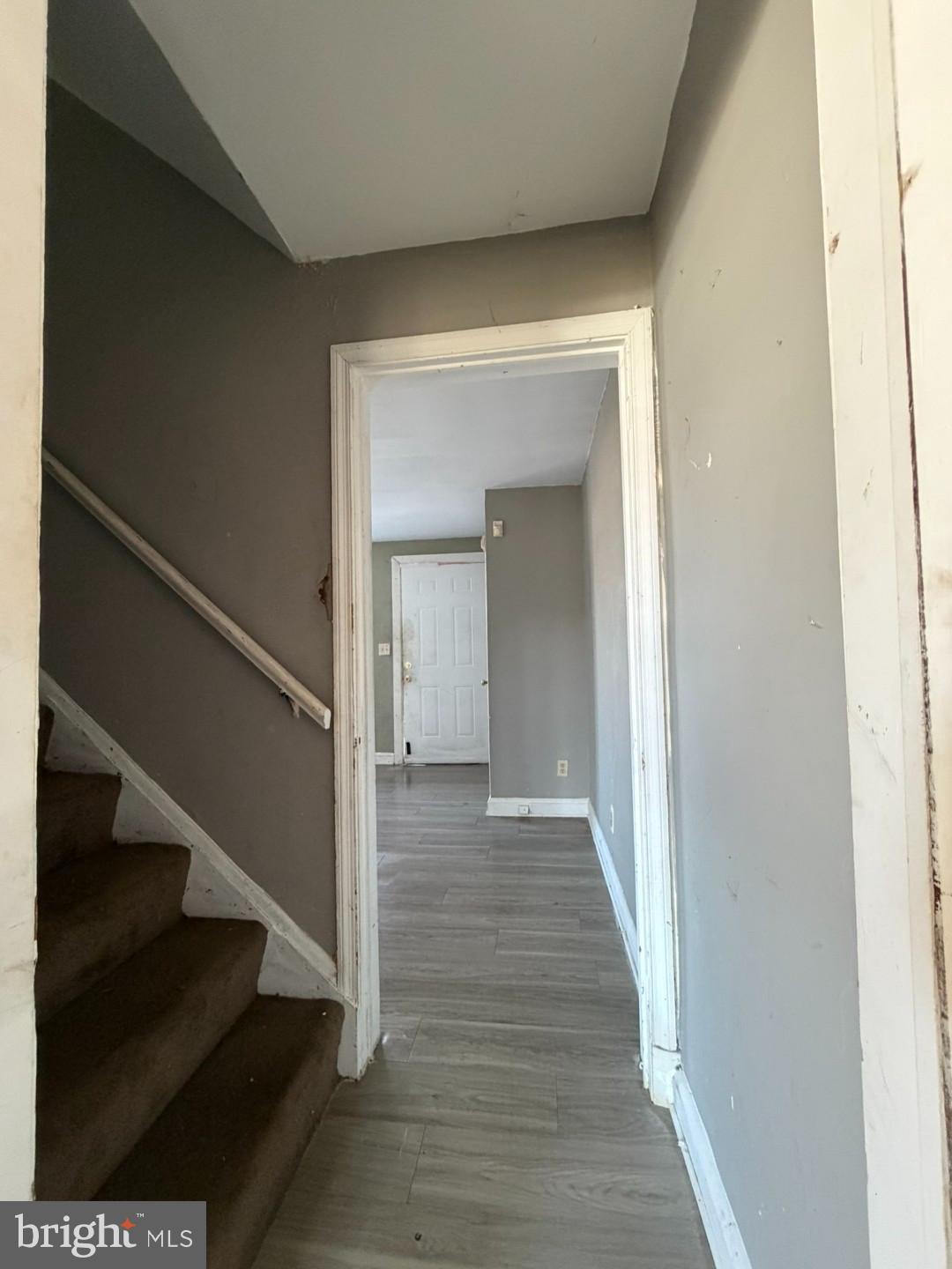 4027 Raymonn Avenue Baltimore, MD 21213 - Photo 7 of 19 a view of a hallway with wooden floor and entryway