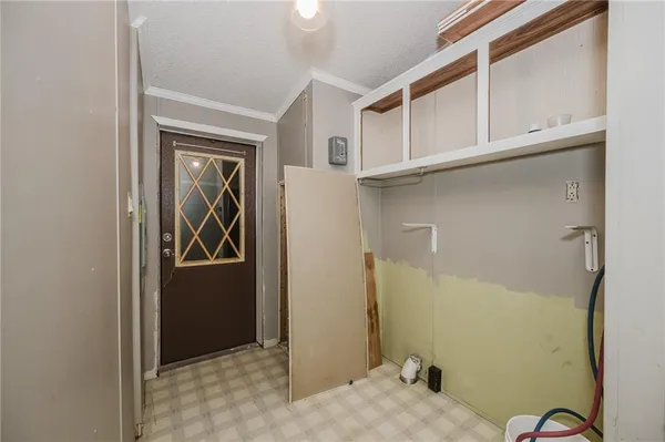 a room with wooden floor and pool table