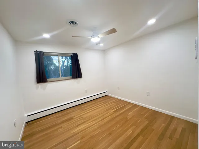 a bathroom with a toilet and a sink