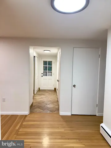 a bathroom with a sink a mirror and a bathtub