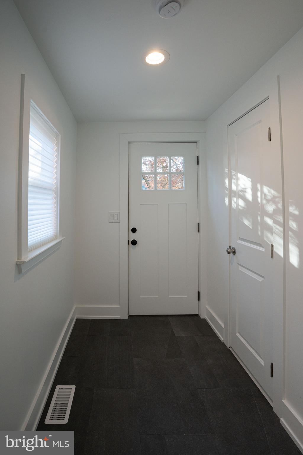 2538 East County Line Road, Unit 1 Ardmore, PA 19003 - Photo 2 of 16 an empty room with windows