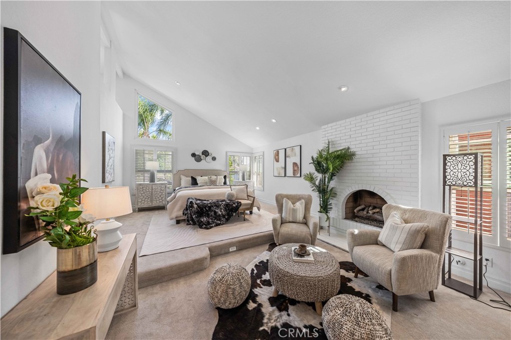 9 Hermosa Irvine, CA 92620 - Photo 13 of 20 a living room with furniture potted plant and a window