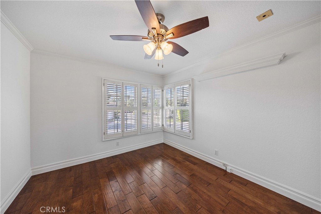 9 Hermosa Irvine, CA 92620 - Photo 16 of 20 an empty room with wooden floor fan and windows